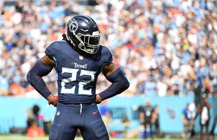 Derrick Henry (22) celebrates after throwing a touchdown pass against the Cincinnati Bengals at Nissan Stadium.